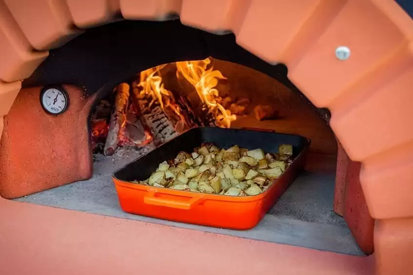 Patate cotte nel forno a legna | Alfa Forni Patate cotte nel forno a legna