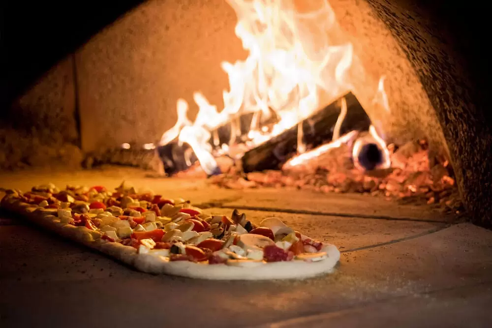 pizza-cotta-nel-forno-a-legna-alfa Making pizza at home: 4 tips to get a pro pizza.