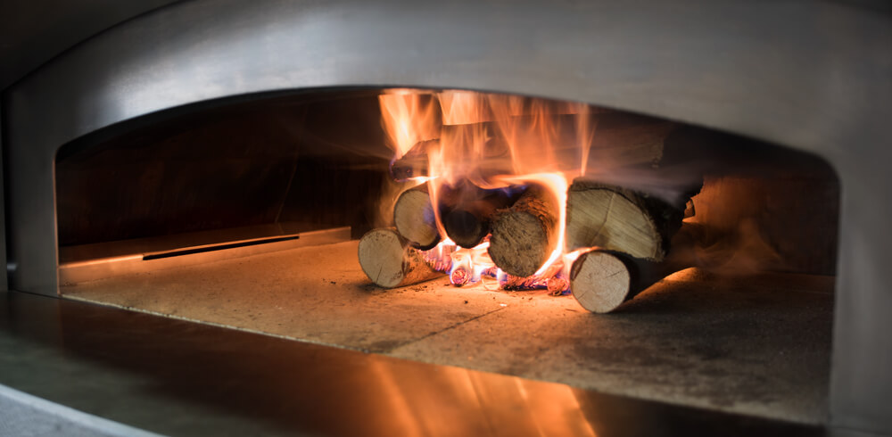 Horno híbrido: cómo cocinar con leña o gas | Alfa Forni